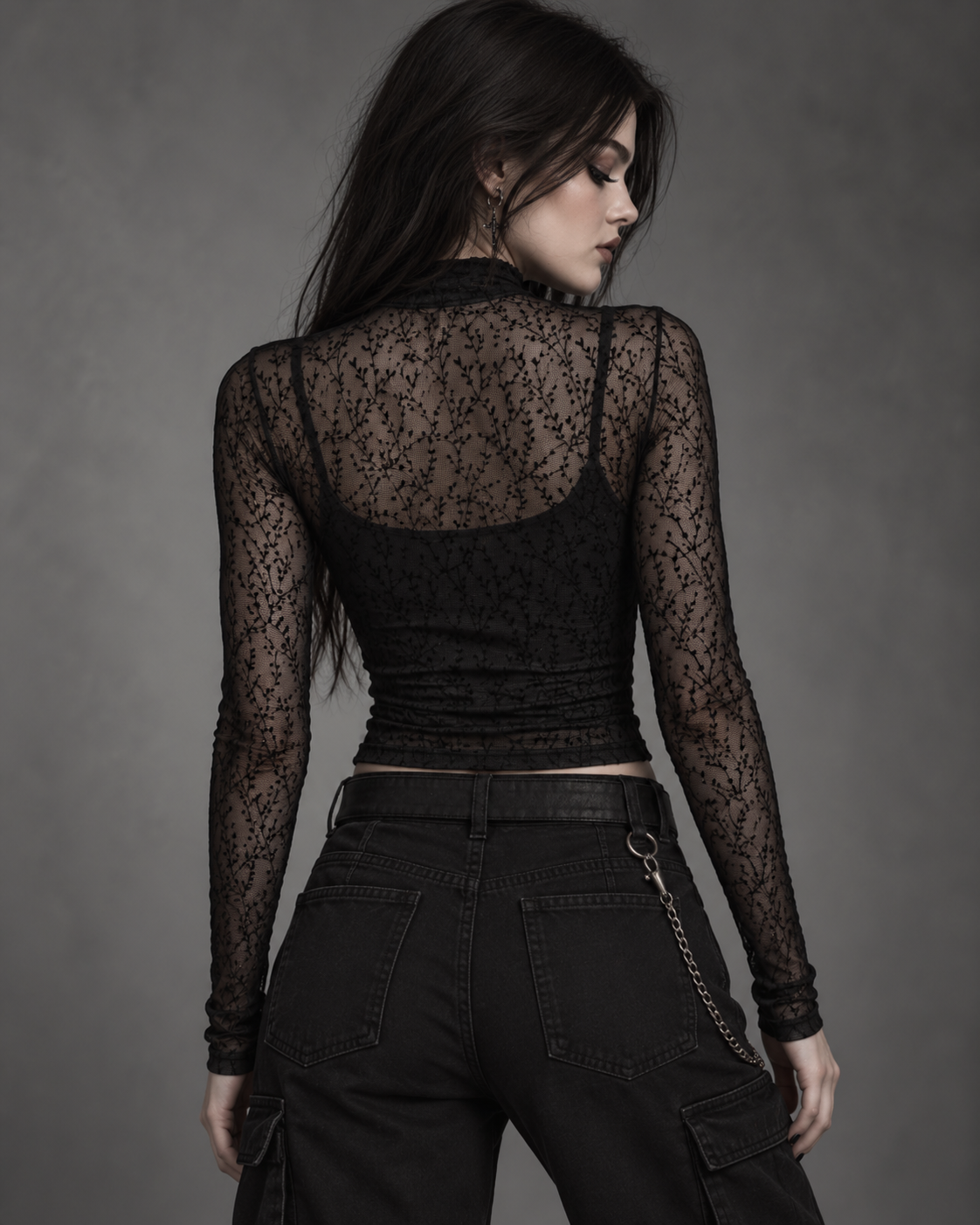 Back styling view of the black flocked mesh top